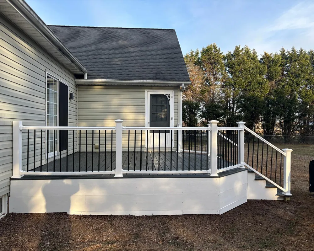 Completed composite deck with railings in Sussex County
