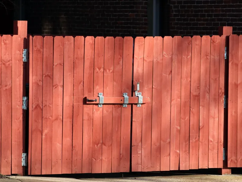 Solid wood double gate with latch hardware